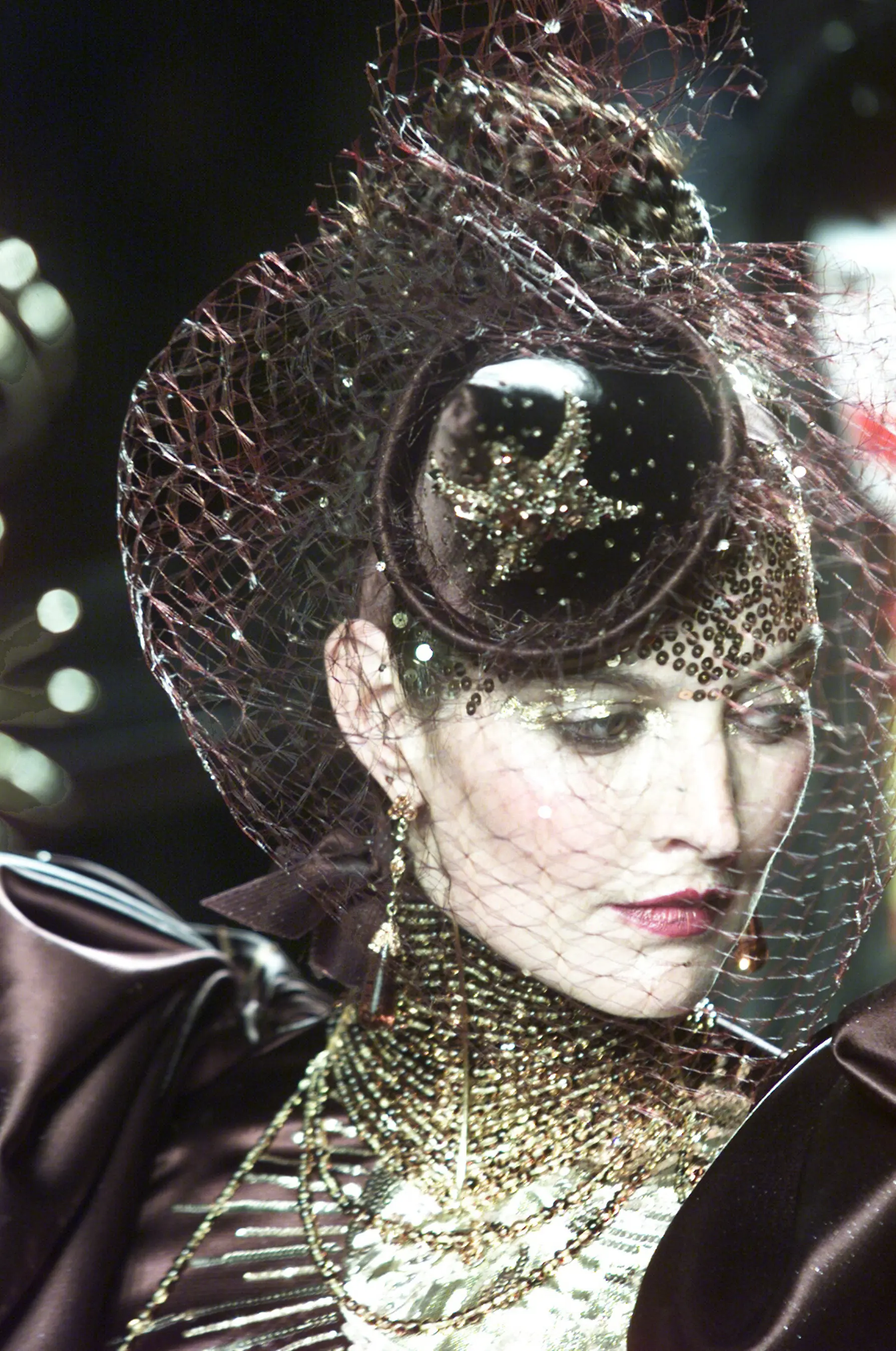 Close up of model walking down Christian Dior Couture runway
